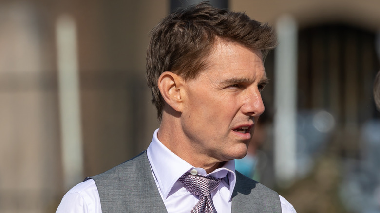 Tom Cruise with a serious expression
