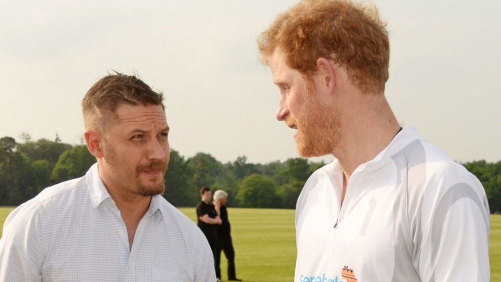 Tom Hardy and Prince Harry talking