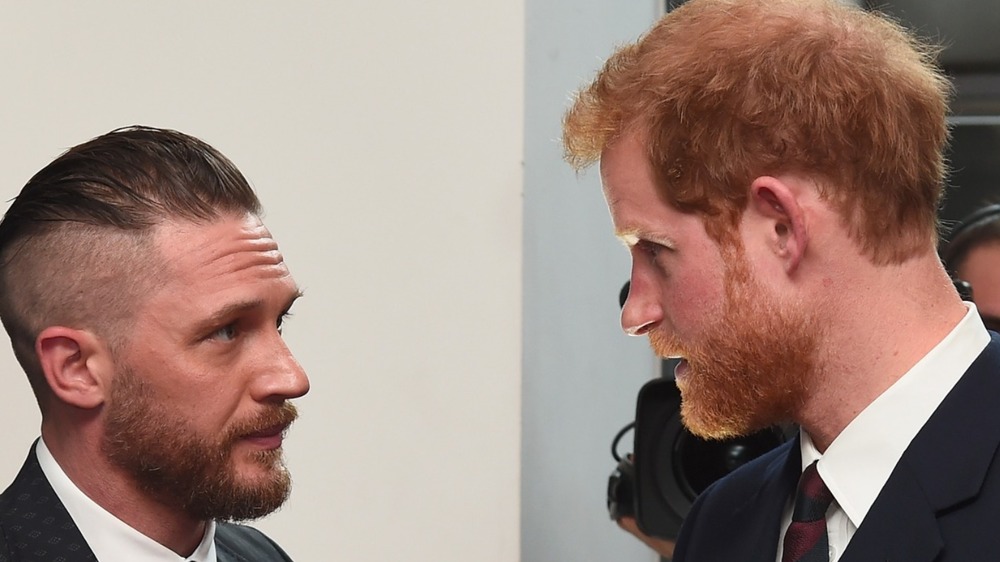 Tom Hardy and Prince Harry talking