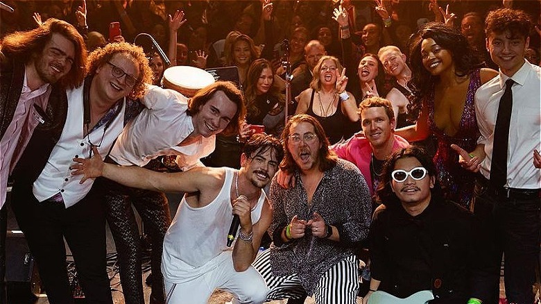 Tom Sandoval and The Most Extras posing with a crowd