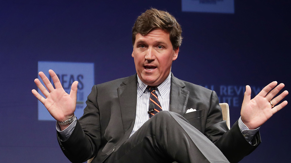 Tucker Carlson speaking to audiences