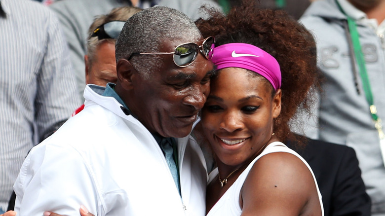 Richard and Serena Williams hug in 2012