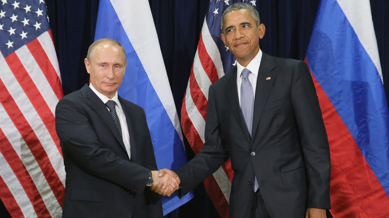 Vladimir Putin and Barack Obama shaking hands