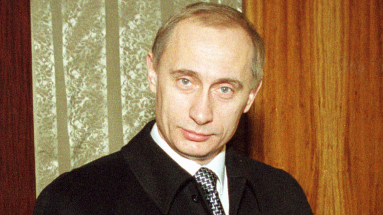 Vladimir Putin with smug expression