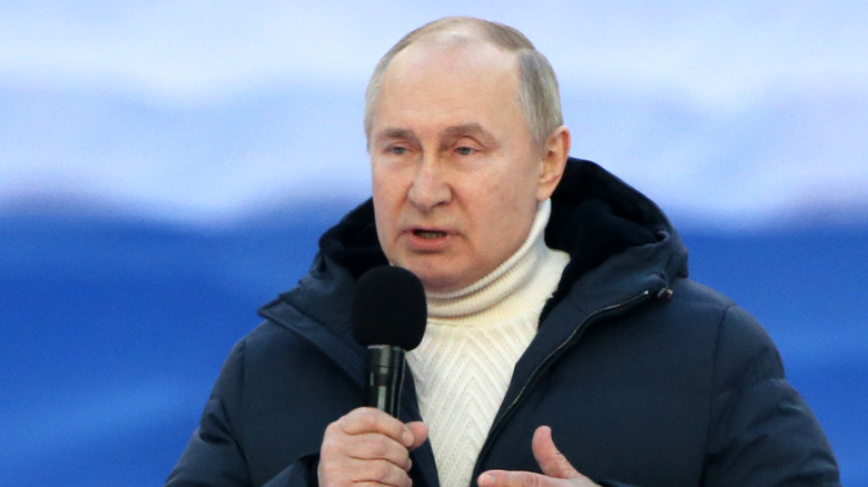 Vladimir Putin speaking outside 