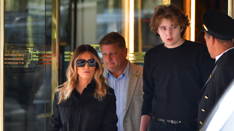 Melania and Barron Trump walking