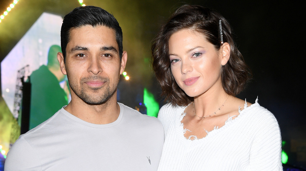 Wilmer Valderrama and Amanda Pacheco posing together