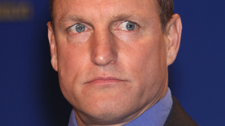Woody Harrelson with a serious expression