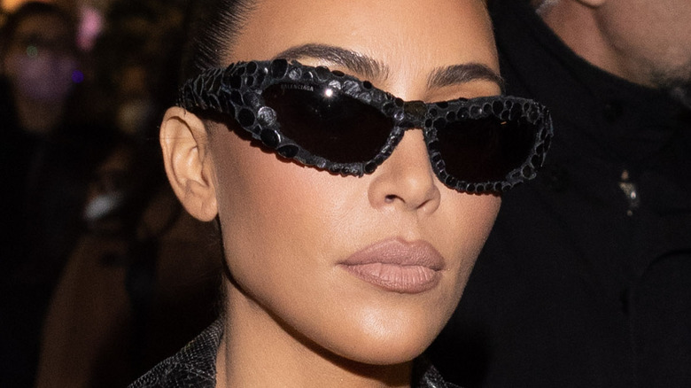 Kim Kardashian wearing black sunglasses