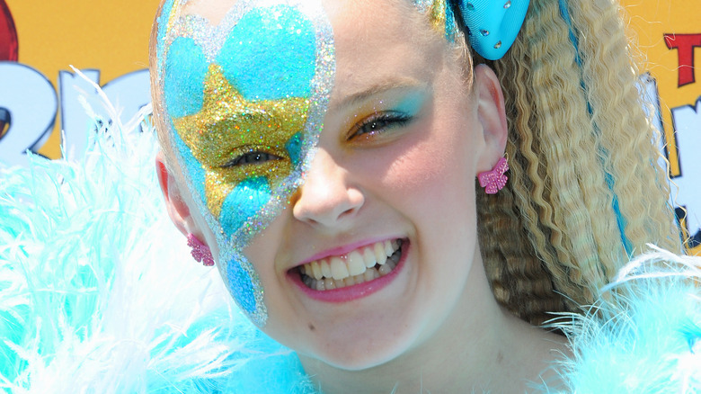 JoJo Siwa wearing glitter facepaint