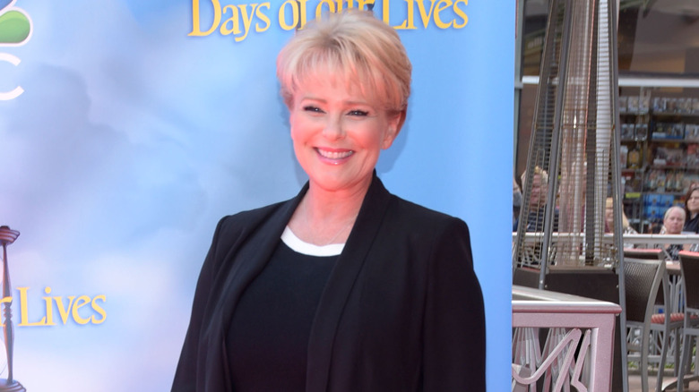 Judi Evans poses at an event
