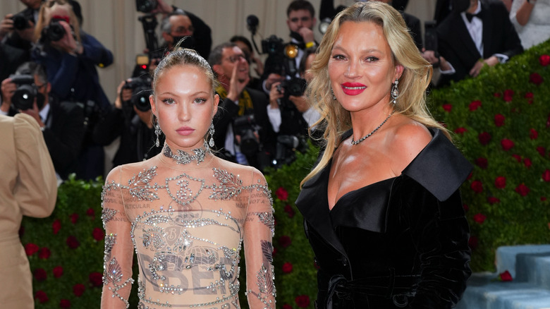 Kate Moss and Lila Moss posing together