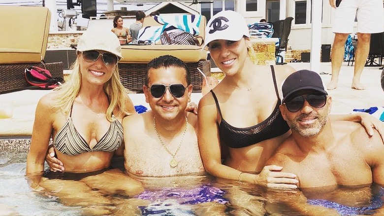 Lisa Valastro, Buddy Valastro, Melissa Gorga, and Joe Gorga in a pool