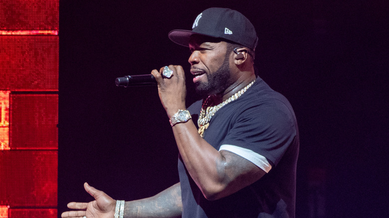 50 cent holding mic