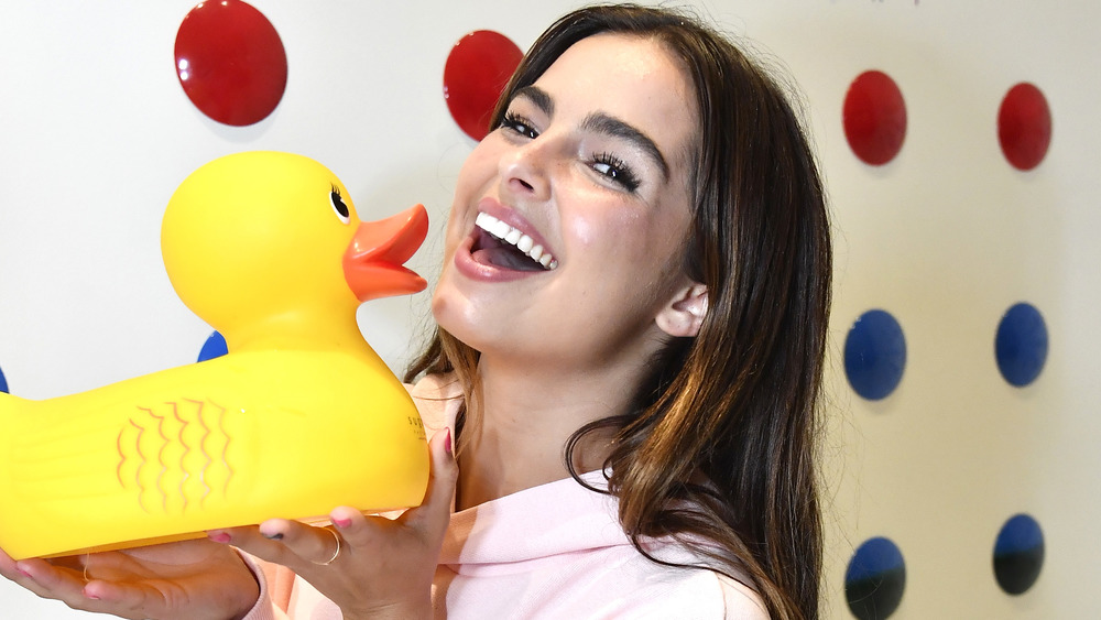 Addison Rae smiling with rubber duck