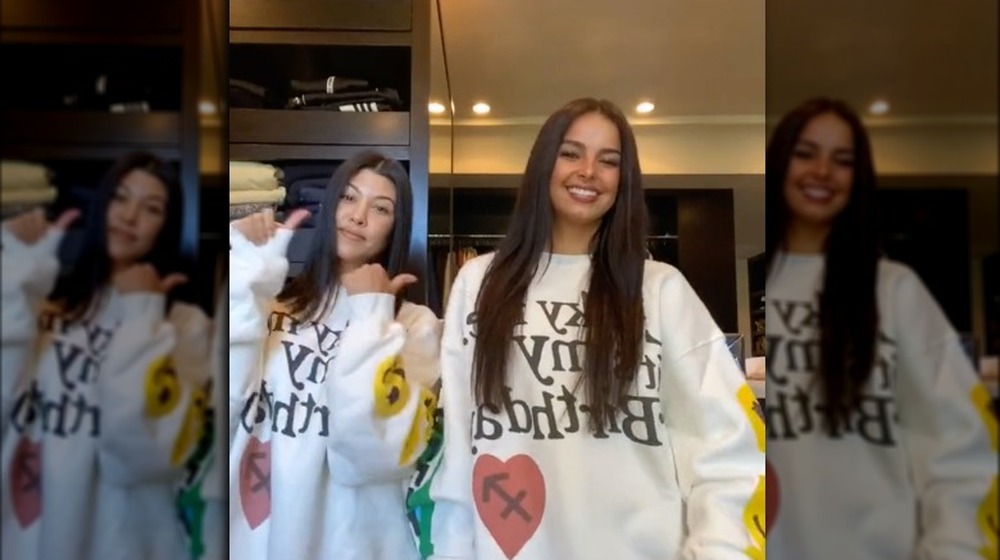 Kourtney Kardashian and Addison Rae dancing