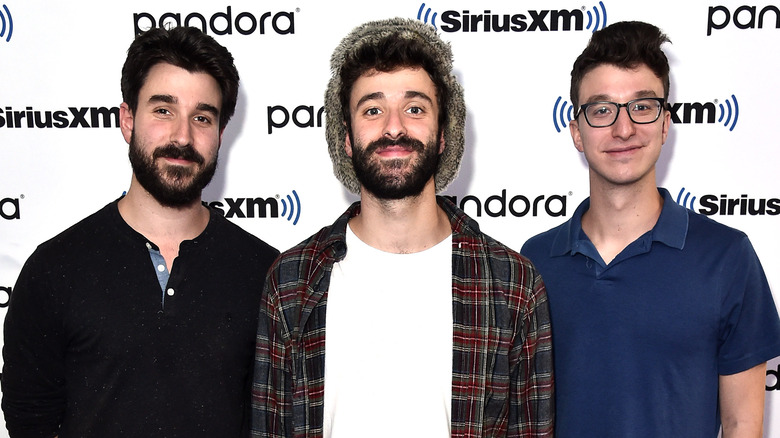 AJR posing on the red carpet