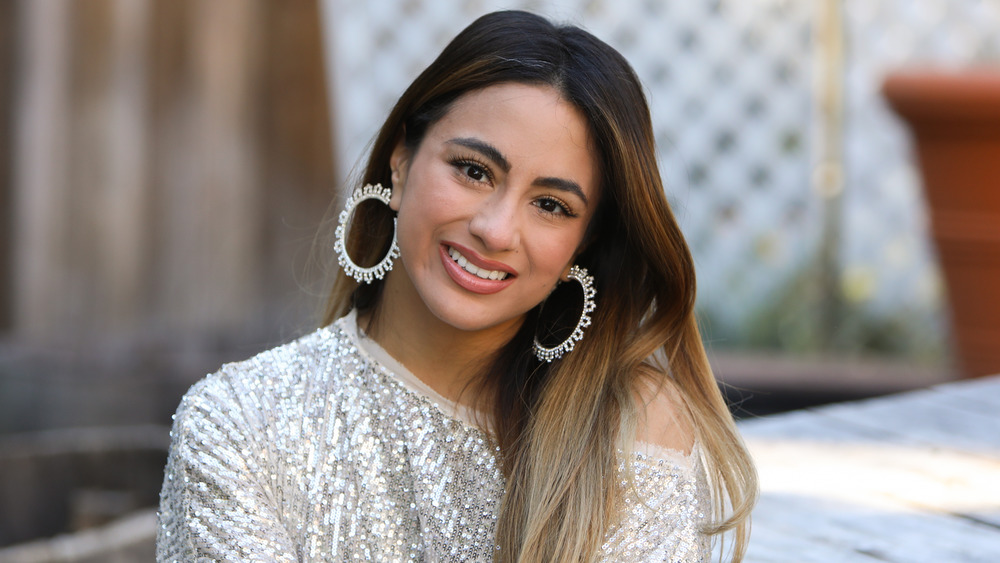 Ally Brooke smiling at the camera