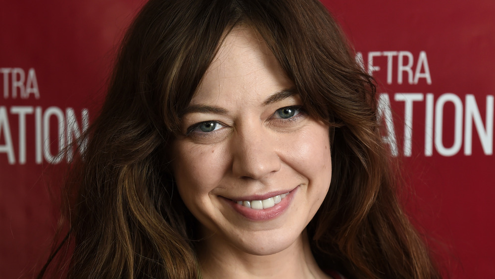 Analeigh Tipton smiling on the red carpet