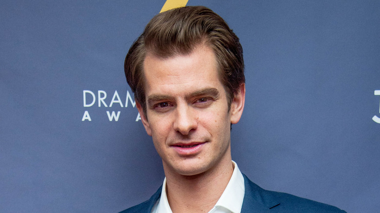 Andrew Garfield holding an award