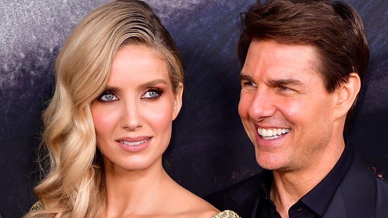 Tom Cruise and Annabelle Wallis posing at event