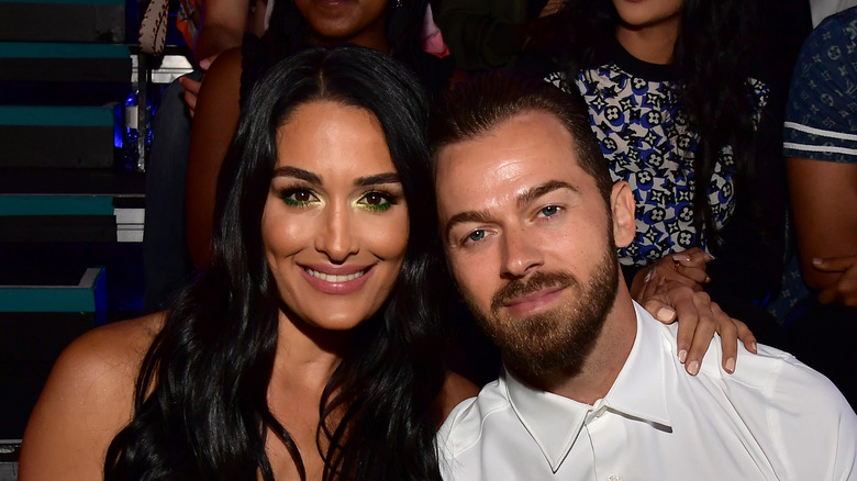Nikki Bella and Artem Chigvintsev smiling
