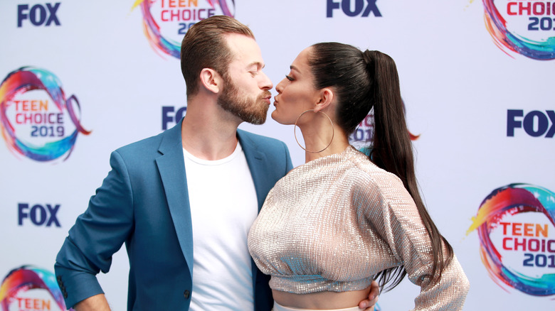 Artem Chigvintsev and Nikki Bella kissing