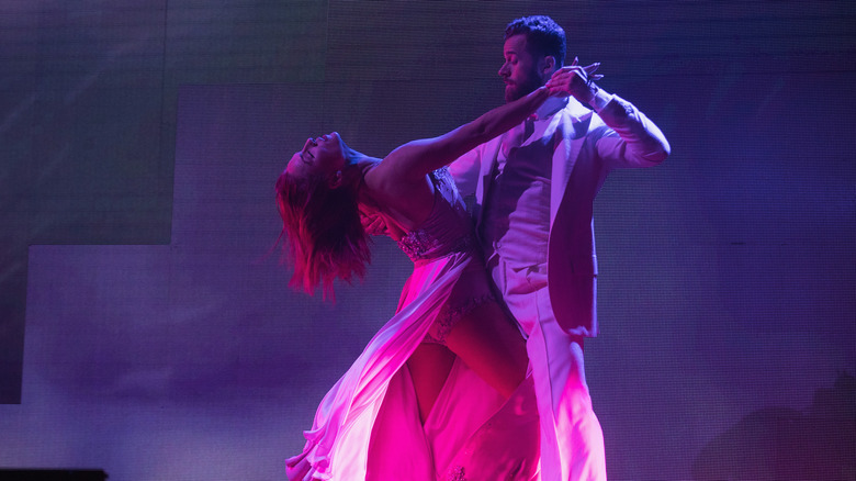 Sharna Burgess and Artem Chigvintsev dancing onstage