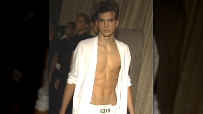Ashton Kutcher in his white modeling sweater and undies, 1997