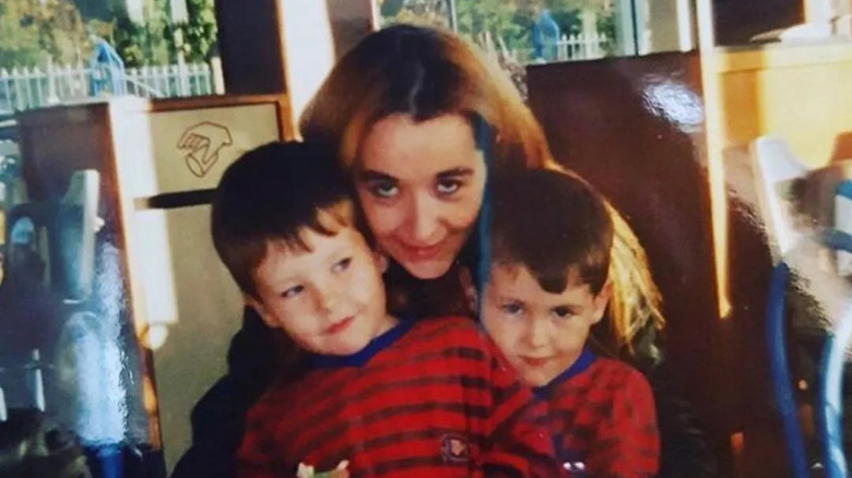Barry Keoghan posing with his mother and brother