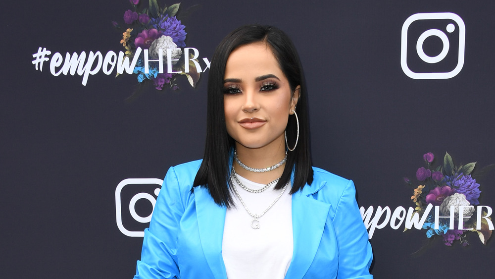 Becky G poses on the red carpet