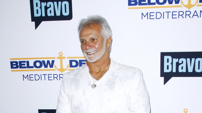 Tanned Captain Lee smiling