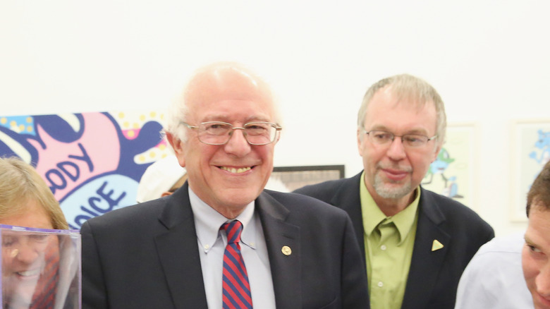 Bernie Sanders and Levi Sanders posing together