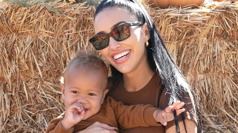 Bre Tiesi smiling with her son, Legendary Cannon
