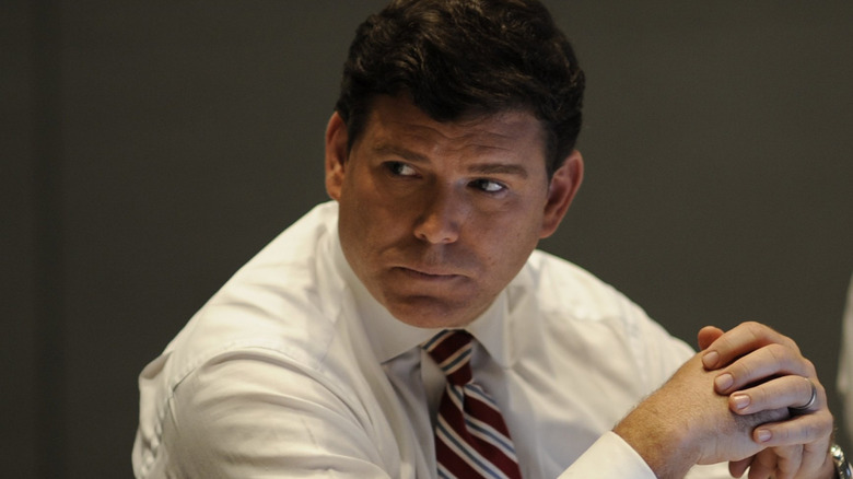 Bret Baier at work, seated