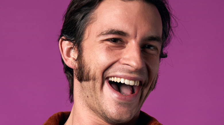 Jonathan Bailey posing for cameras