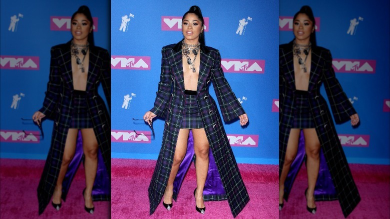 Hennessy Carolina wearing a fashionable outfit