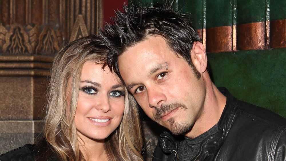 Carmen Electra and Rob Patterson posing together