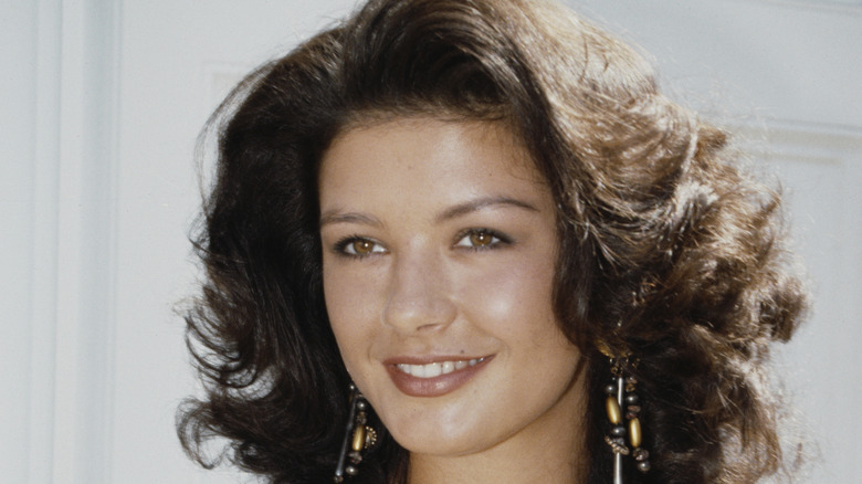 Young Catherine Zeta-Jones smiling