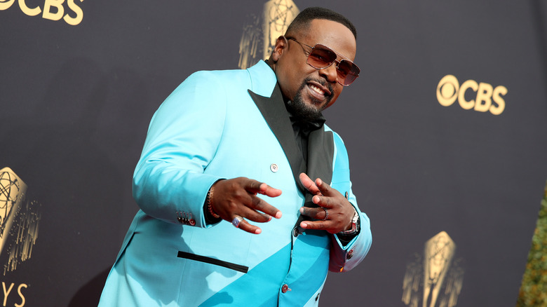 Cedric the Entertainer smiling and posing