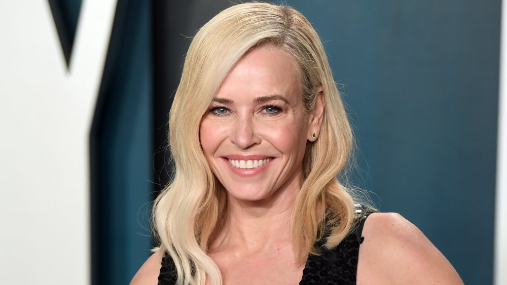 Chelsea Handler in a black dress, smiling at the 2020 Vanity Fair Oscars Party