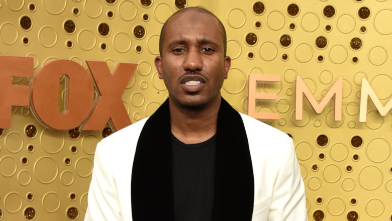 Chris Redd in a white jacket