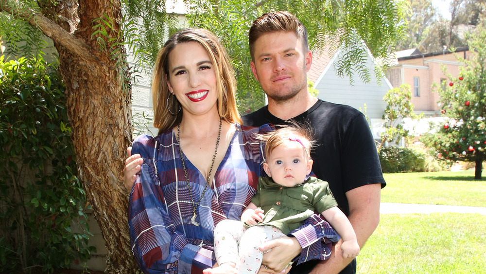 Christy Carlson Romano, Brendan Rooney, and their daughter