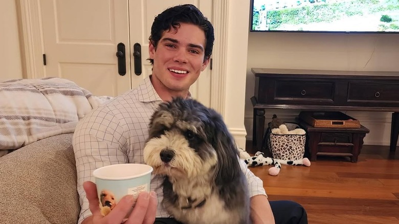 Clavicular posing with a dog on Instagram