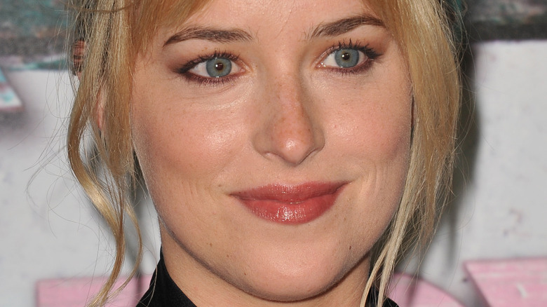 Dakota Johnson smiling blonde hair