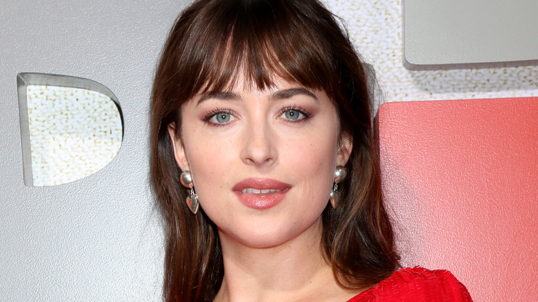 Dakota Johnson in silver earrings 