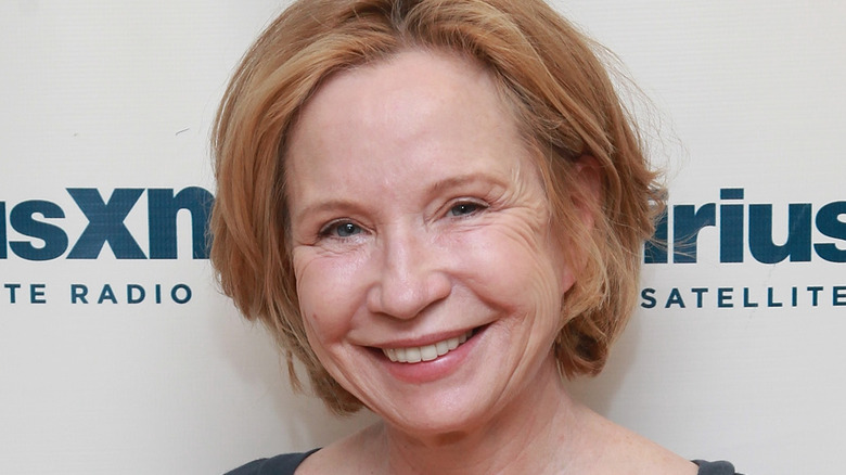 Debra Jo Rupp posing on the red carpet