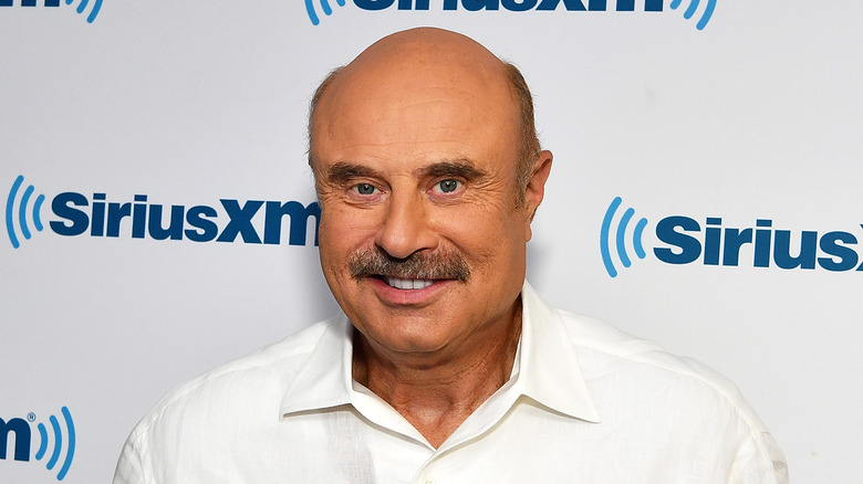 Dr. Phil McGraw grinning at SiriusXM studios