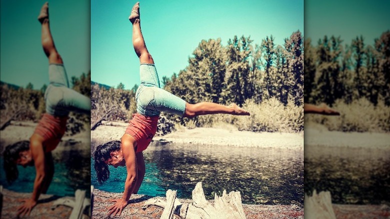 Emily Compagno outdoors doing a flip