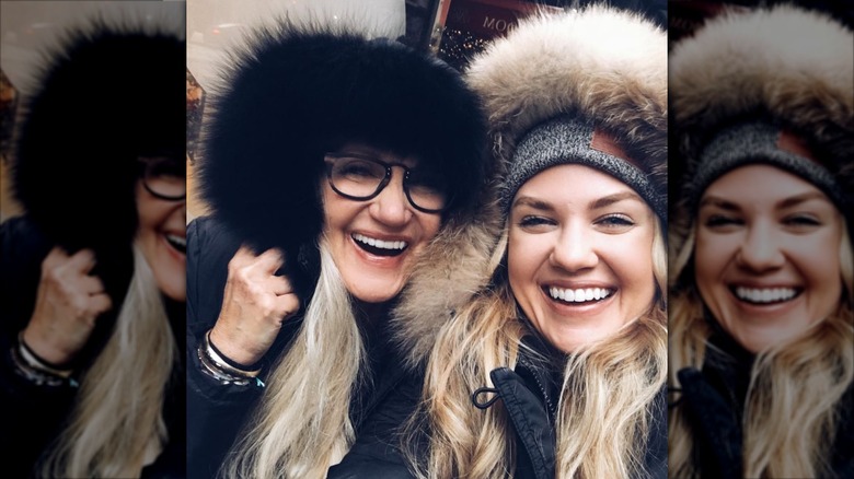 Erika Kirk and her mother Lori Frantzve smiling in hats